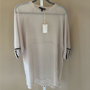 Elegant Beige Long Sleeve Shirt with Black Accents